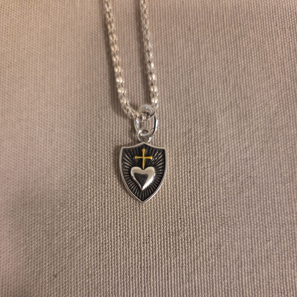 Silver Shield Pendant Necklace with Yellow Cross Accent